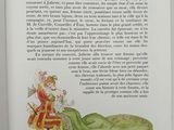 an open book with a picture of a man and a snake