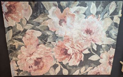 a picture of a painting of flowers on the wall