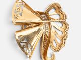 gold plated butterfly brooch with filigree details