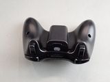 a close up of a video game controller on a table