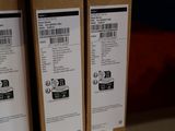 three boxes of acer products are stacked on top of each other