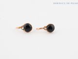 a pair of black onyx earrings with diamonds