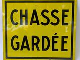a yellow sign that says chasse gardiee on it