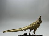 an antique bronze pheasant figurine on a marble base
