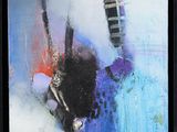 abstract painting of a black and white cow in a blue and red field