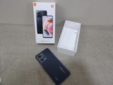 an image of a box with a phone in it sitting on a table