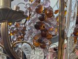 a chandelier with a bunch of crystal beads hanging from it