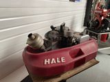 a red box with a small engine inside of it