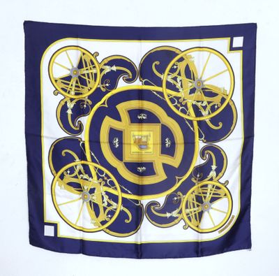 a blue and yellow square scarf with a design of bicycles