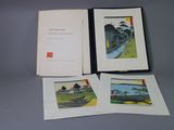 three books on a table with a picture of a river in the background