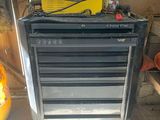 an image of a tool cabinet with tools in it