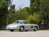 an image of a silver sports car parked in a parking lot