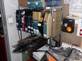 a room with a bunch of boxes and boxes on the shelves