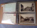 an old photo of a book with pictures of buildings on it