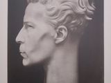 a black and white photo of a bust of a man