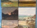 quatre tableaux représentant un paysage sont exposés sur un fond bleu
