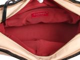 the inside of a chanel handbag with a red lining