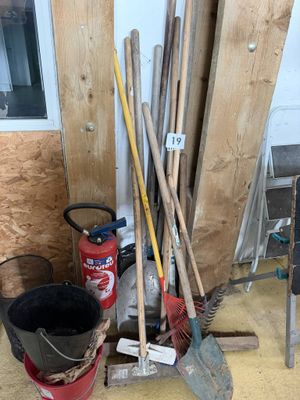 a lot of tools that are sitting on the floor