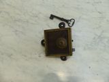 a small key that is sitting on top of a table