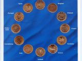 une image représentant une photo représentant une photo de différentes pièces de monnaie