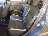the back seats of a small car are clean and ready to be used