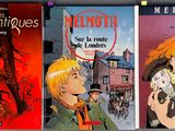 three books are lined up on a shelf in front of a window