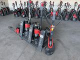 many different types of forklifts lined up in a warehouse