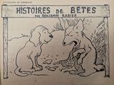 an old book with a drawing of a dog and a cat on it
