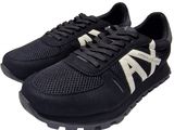 a picture of a pair of black sneakers on a white background