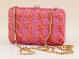 pink and orange clutch bag with gold chain strap