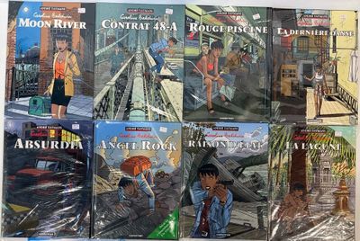 un grand nombre de livres posés sur une table
