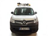 a picture of a white van with skis on the roof