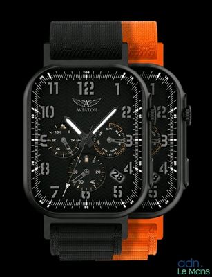 une montre noire et orange avec un cadran noir sur fond noir