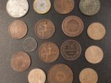 many different types of coins on the table