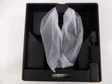 a black box with a pair of shoes in it