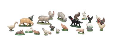 a lot of farm animals that are on the table