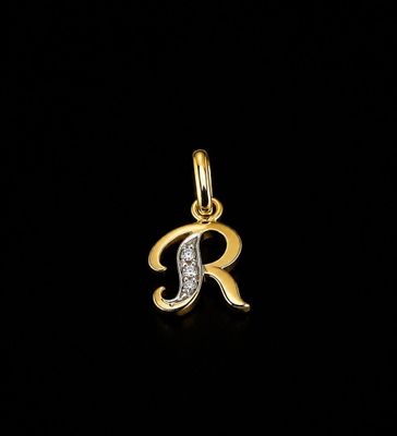 a gold initial charm with diamonds on a black background