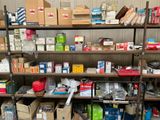 many boxes and boxes on the shelves in the room