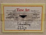 a picture of a time art certificate on a wall
