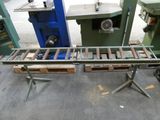 une image d'une machine qui travaille sur un morceau de bois