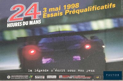 a poster with a picture of a sports car on it