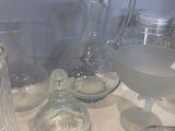 a table with a lot of glass items on it