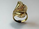 an image of a gold ring with diamonds on a white surface