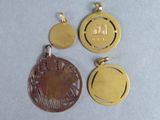 three gold and silver pendants with the words i love you on them