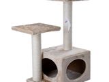 a close up of a cat tree with a scratching post