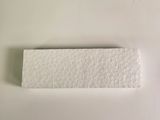 a white piece of paper on a white surface