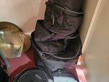 a pile of luggage sitting on the floor next to a door