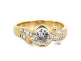 a close up of a diamond ring on a white background