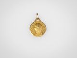 une pièce d'or portant un visage de femme