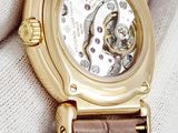 a close up of a watch on a person ' s wrist